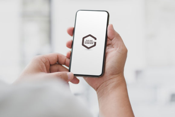 Download Business Man Holding Mock Up Smartphone - Holding Collection